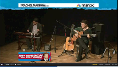 TV Screen Shot of Matthew Montfort and Bui Huu Nhut Performing on the Rachel Maddow Show