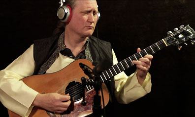 Photo of Scalloped Fretboard Guitarist Matthew Montfort